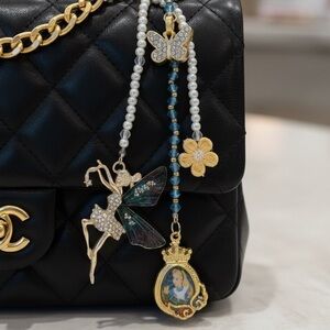 NWT ALICE IN WONDERLAND BAG CHARM KEYCHAIN TOOTH FAIRY FLORAL CROWN